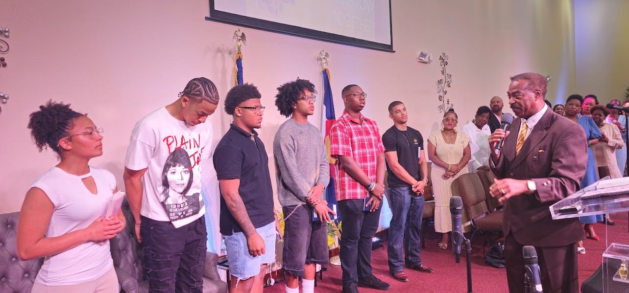 Youth group members celebrating together at Emmanuel Christian Center